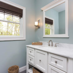 Custom Vanity with Framed Mirror by Walpole Cabinetry